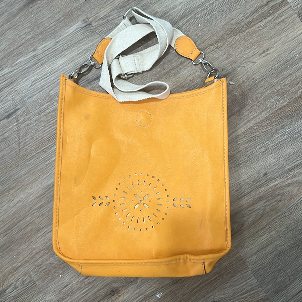 Orange shoulder bag.